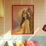 Framed portrait of a woman with flower crown.