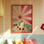 Colorful wall art with cherries and sunburst.